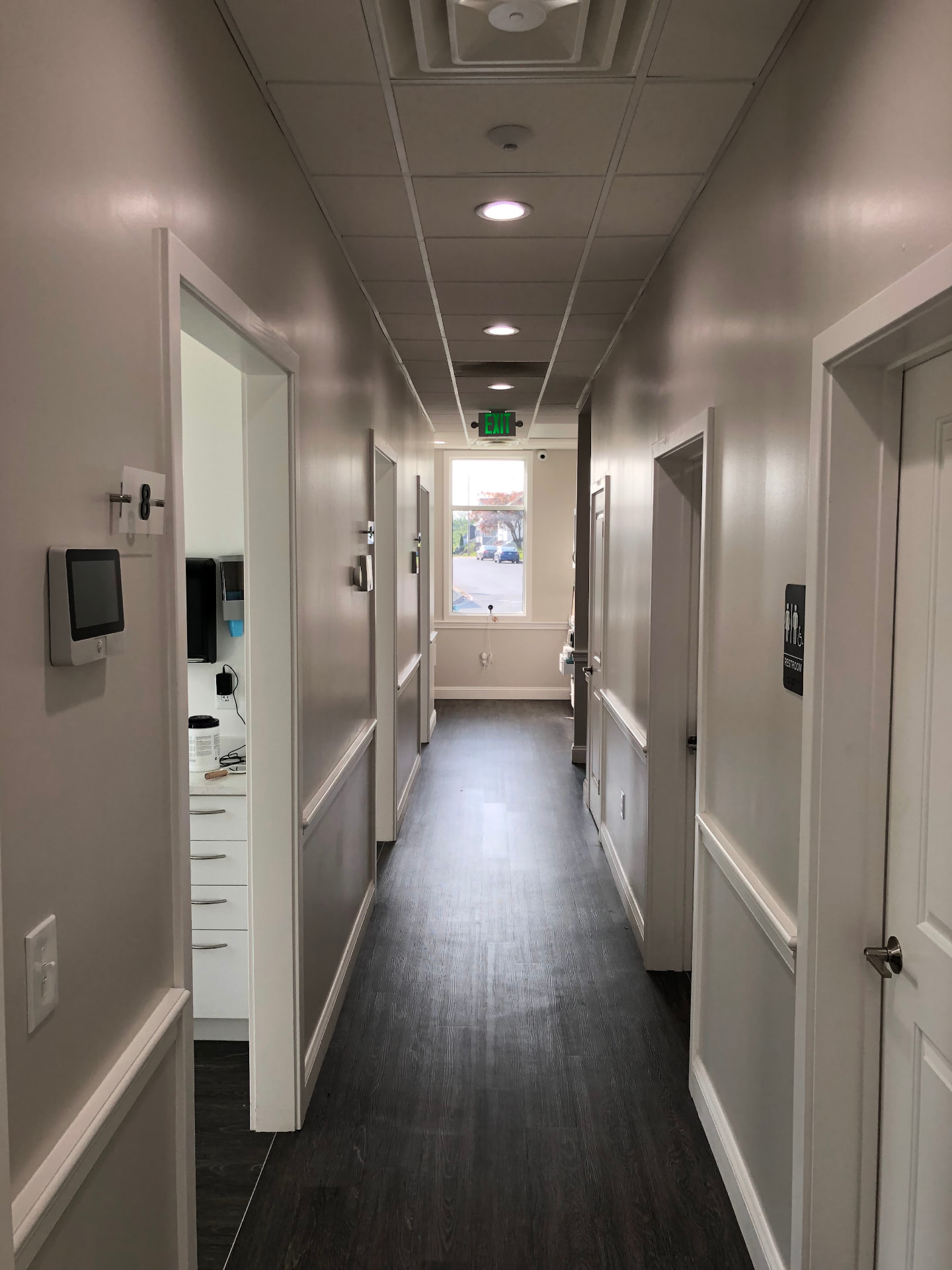 Bright, step-free hallway between treatment rooms