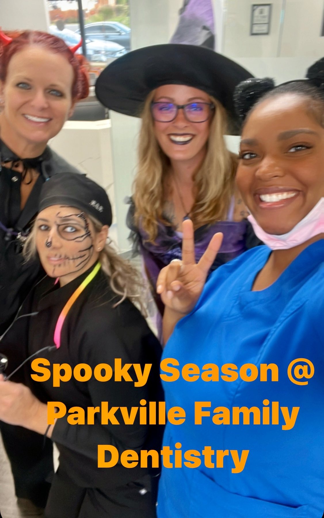 Costumed Parkville Family Dentistry team members celebrating Halloween