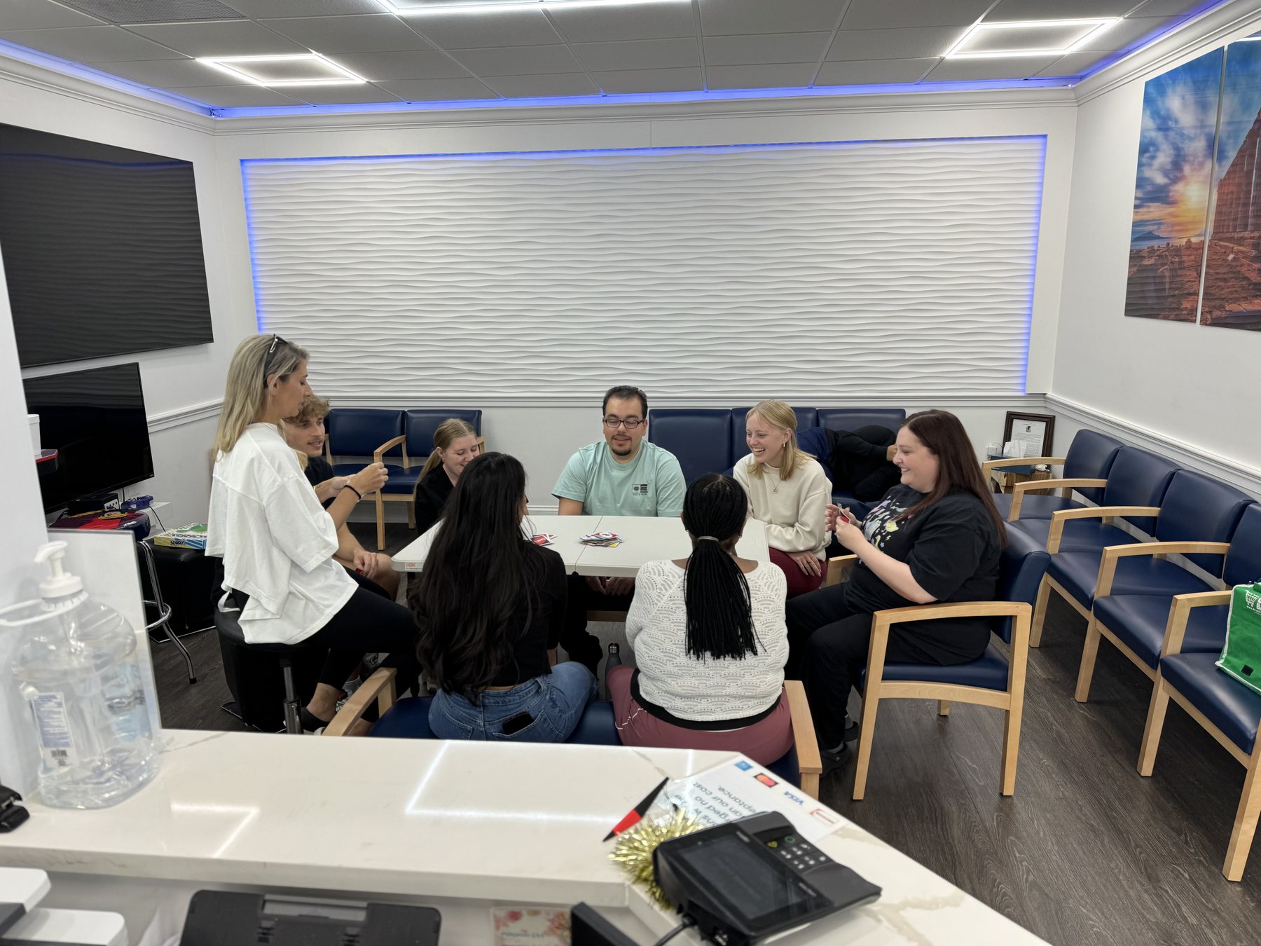 Parkville Family Dentistry team sharing pizza and games